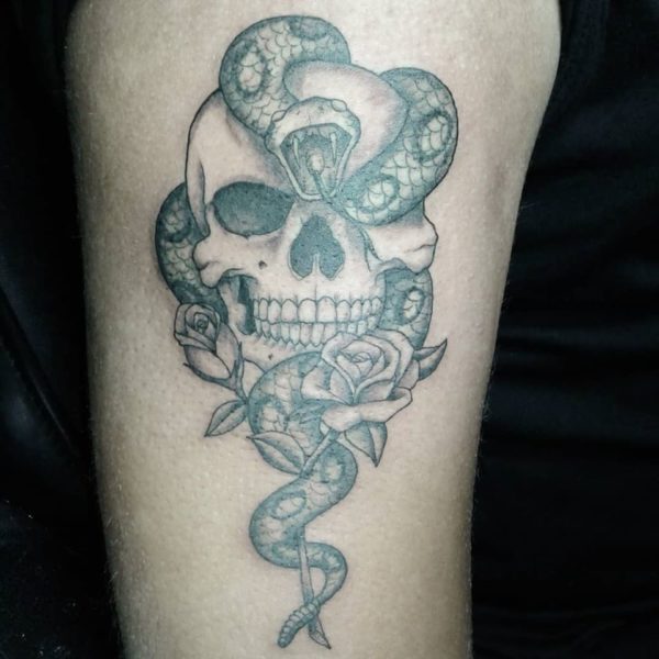 Skull, snake, roses tattoo
