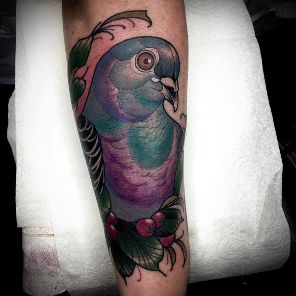 pigeon arm tattoo